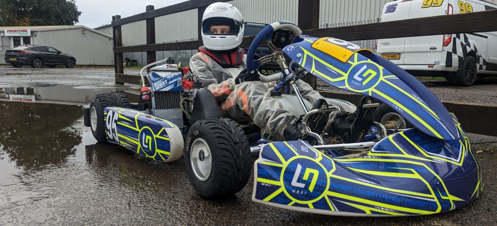 Image showing Riley sat in his LN4 Kart waiting to go out on track at Bayford Meadows Kart Circuit.